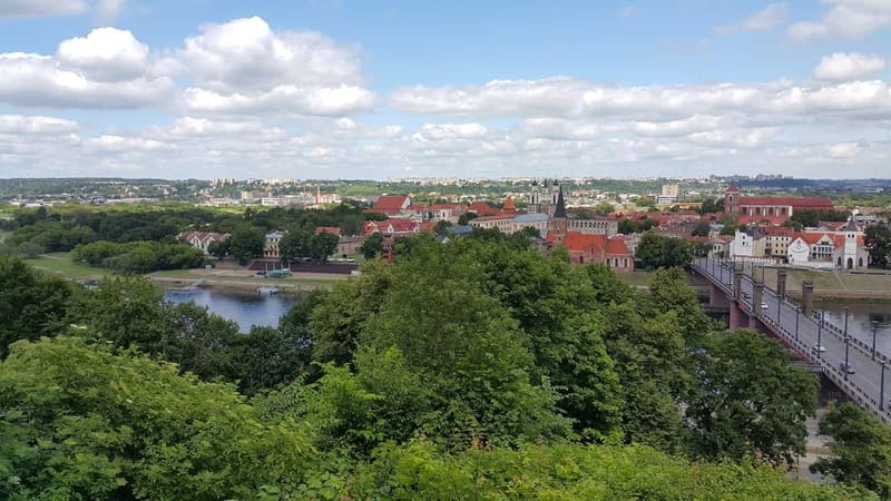 From Vilnius: Kaunas, Trakai and Paneriai Forest - Trakai Island Castle and lake time, with Karaim lunch or a boat option