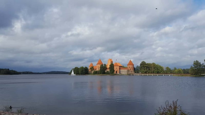 From Vilnius: Trakai Castle and Paneriai Memorial Tour - Paneriai Memorial Park: where the forest becomes history