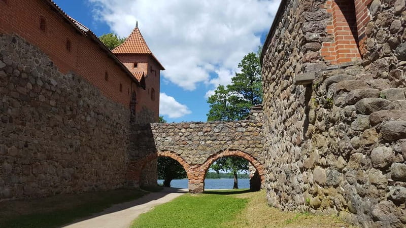 From Vilnius: Trakai Castle and Paneriai Memorial Tour - Trakai Castle on Lake Galvė: the island approach that feels straight from a storybook
