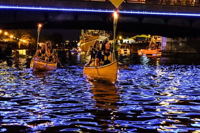 Night Canoe City Tour in Klaipeda - Night atmosphere, torches, and the way light shapes your memory