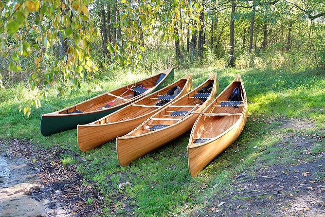 Premium guided Canoe Tour in lake Plateliai Handcrafted inventory and picnic set - The handmade canoe and Janis’s hands-on style