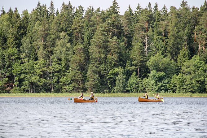 Premium guided Canoe Tour in lake Plateliai Handcrafted inventory and picnic set - The Zemaitija National Park paddle: 4 hours of lake and forest views