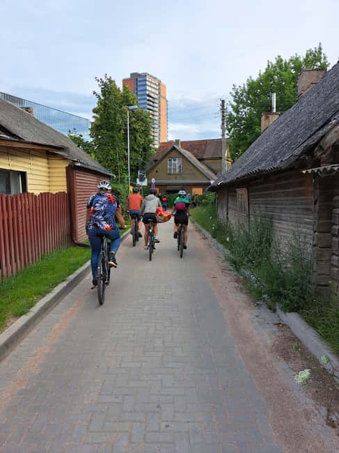 Vilnius: Private Soviet Vilnius Bike Tour - Soviet modernist buildings, original features, and street-level texture